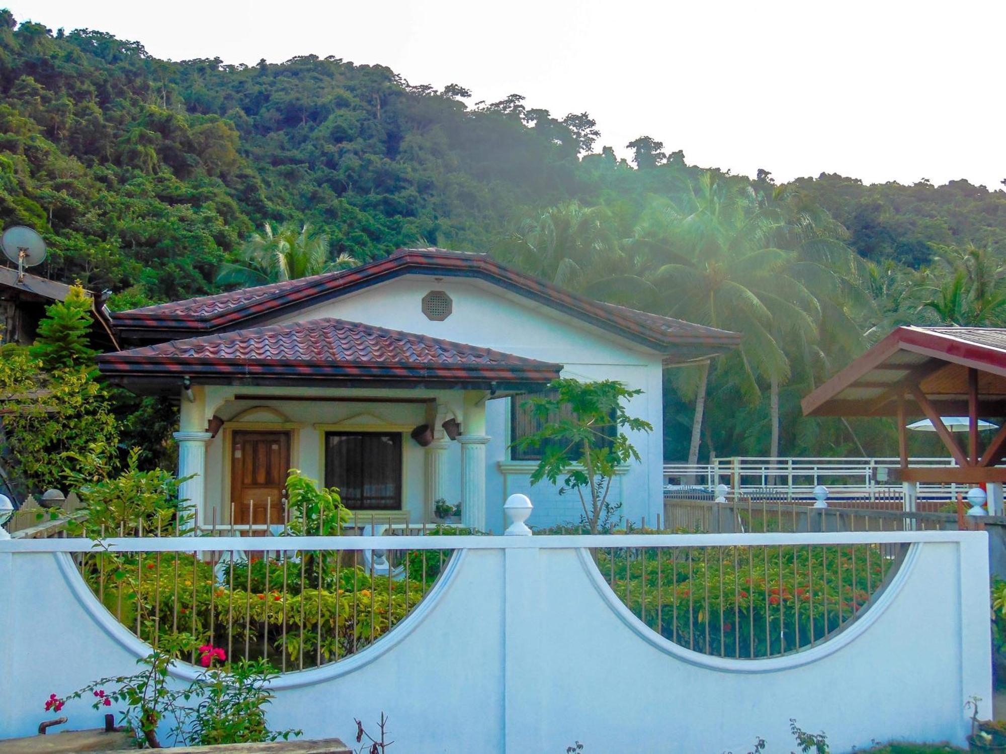 אל נידו Pangulatan Beach Resort חדר תמונה